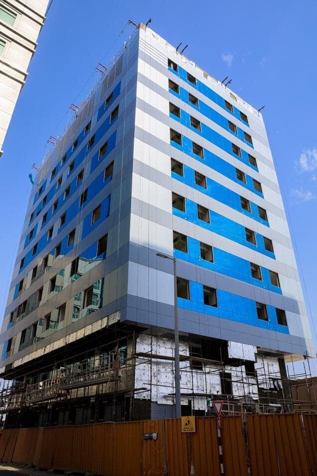 Commercial and residential building in Abu Dhabi with ALUCOPANEL cladding
