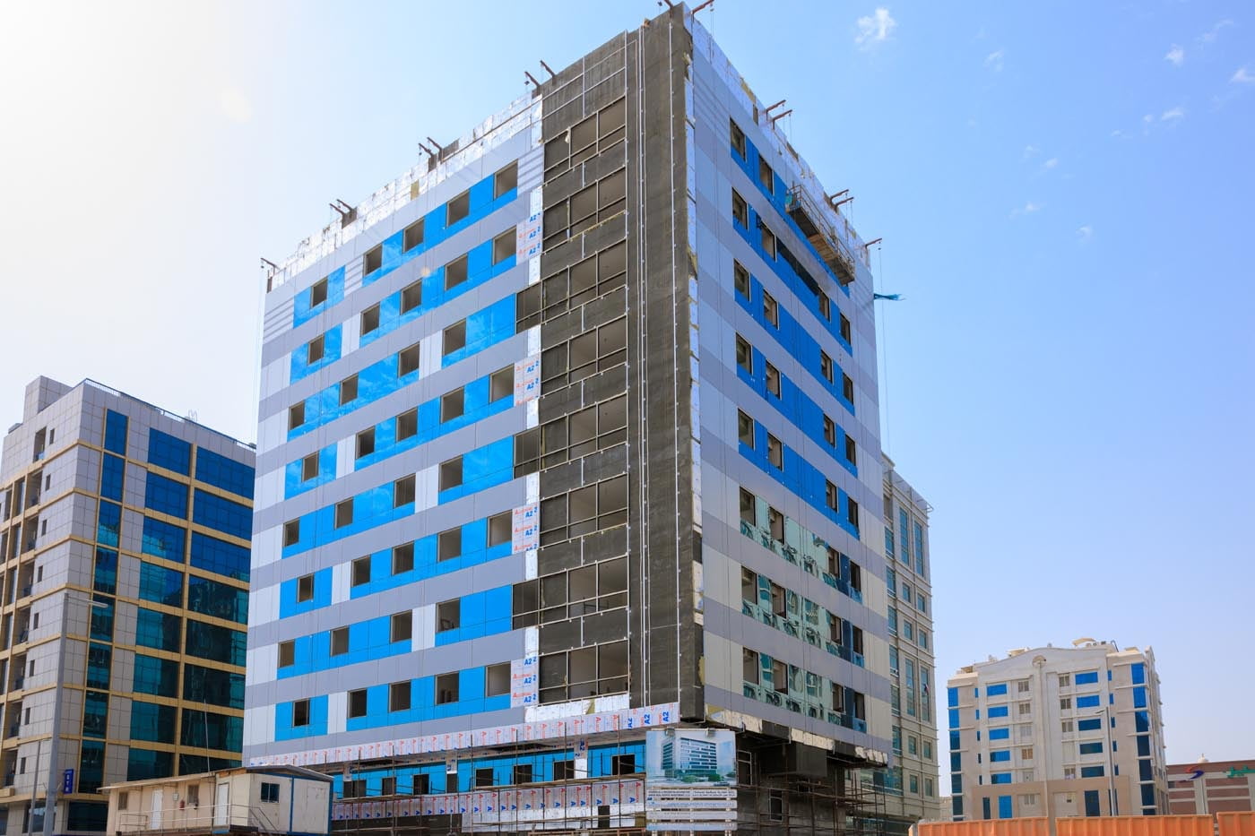 Omeir commercial and residential building in Abu Dhabi, clad with ALUCOPANEL