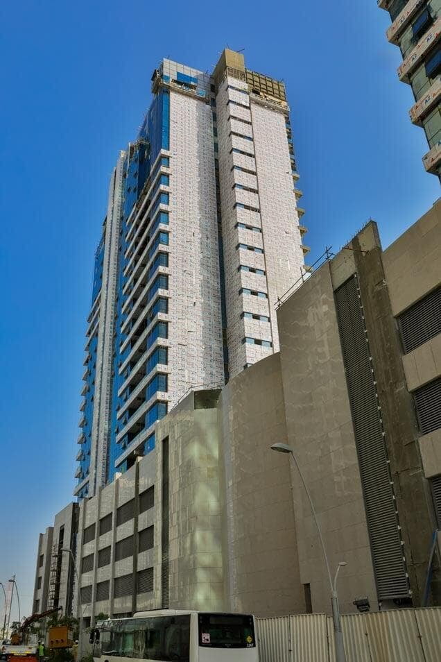 Eclipse Twin Tower facade with ALUCOPANEL cladding