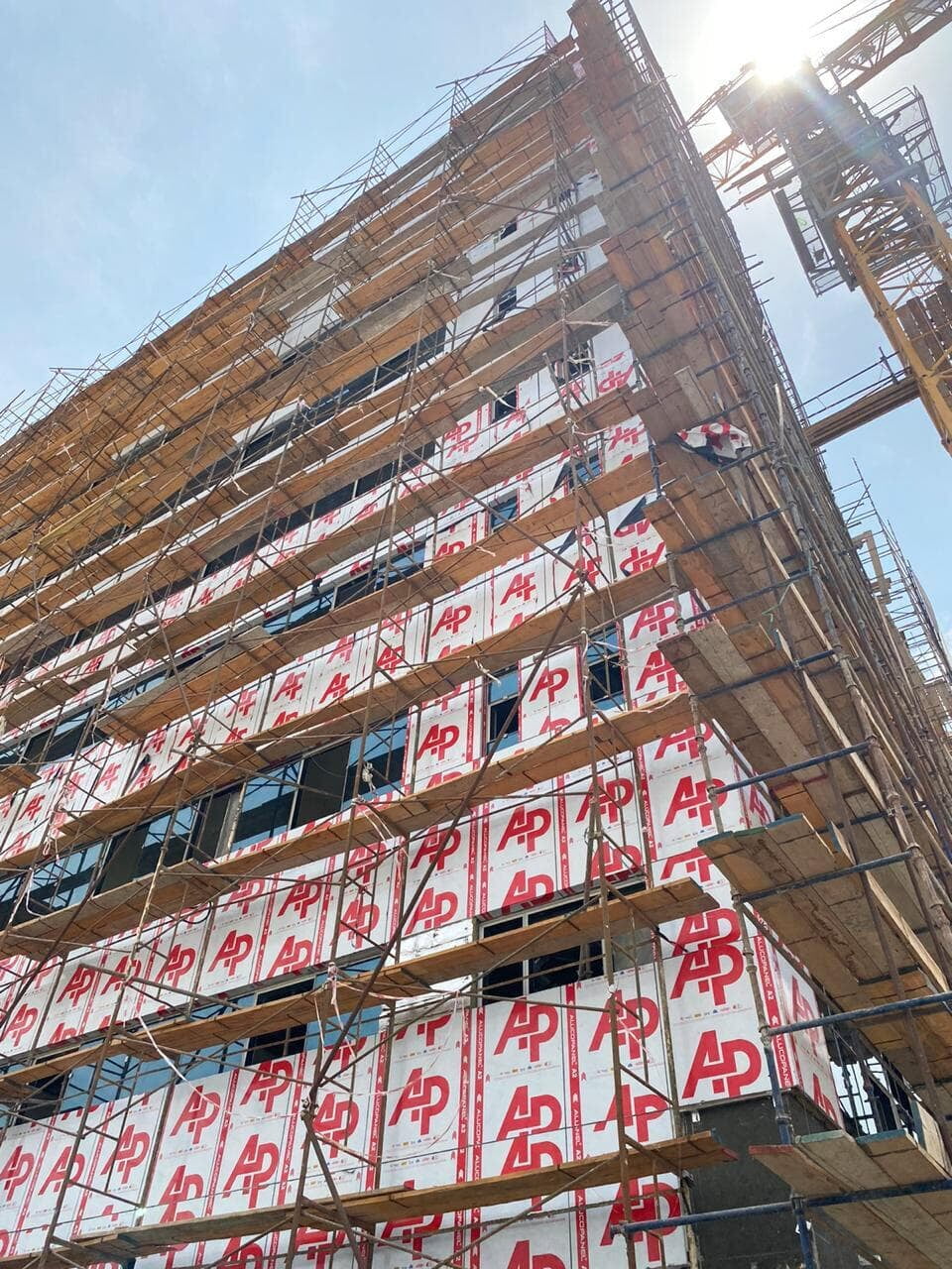Modern commercial building in Khalifa City with ALUCOPANEL exterior