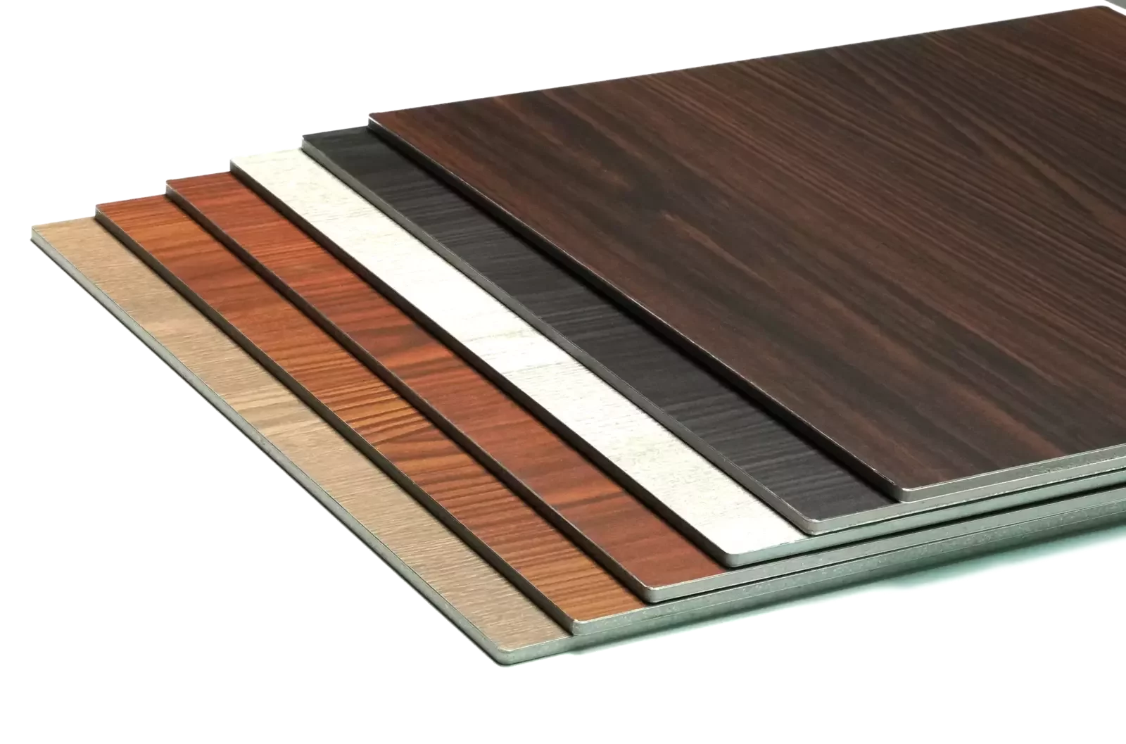 Aluminium composite panel sheets in natural wood-grain finishes, fanned out to show the aluminium skins and core at the panel edge