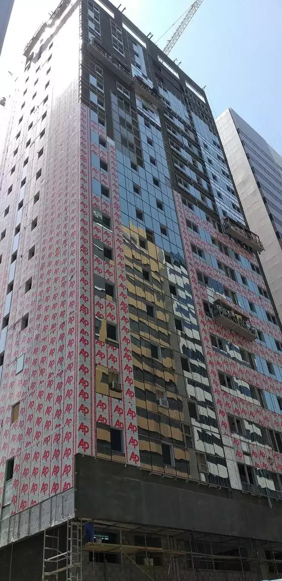 View of the commercial building in Abu Dhabi clad with ALUCOPANEL