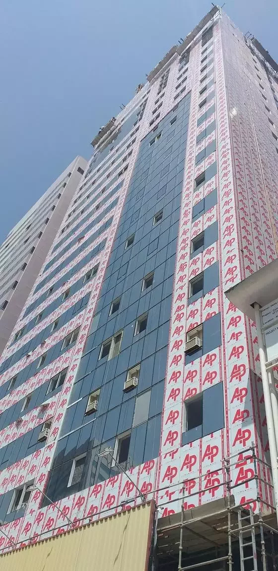 Commercial building facade in Abu Dhabi clad with ALUCOPANEL