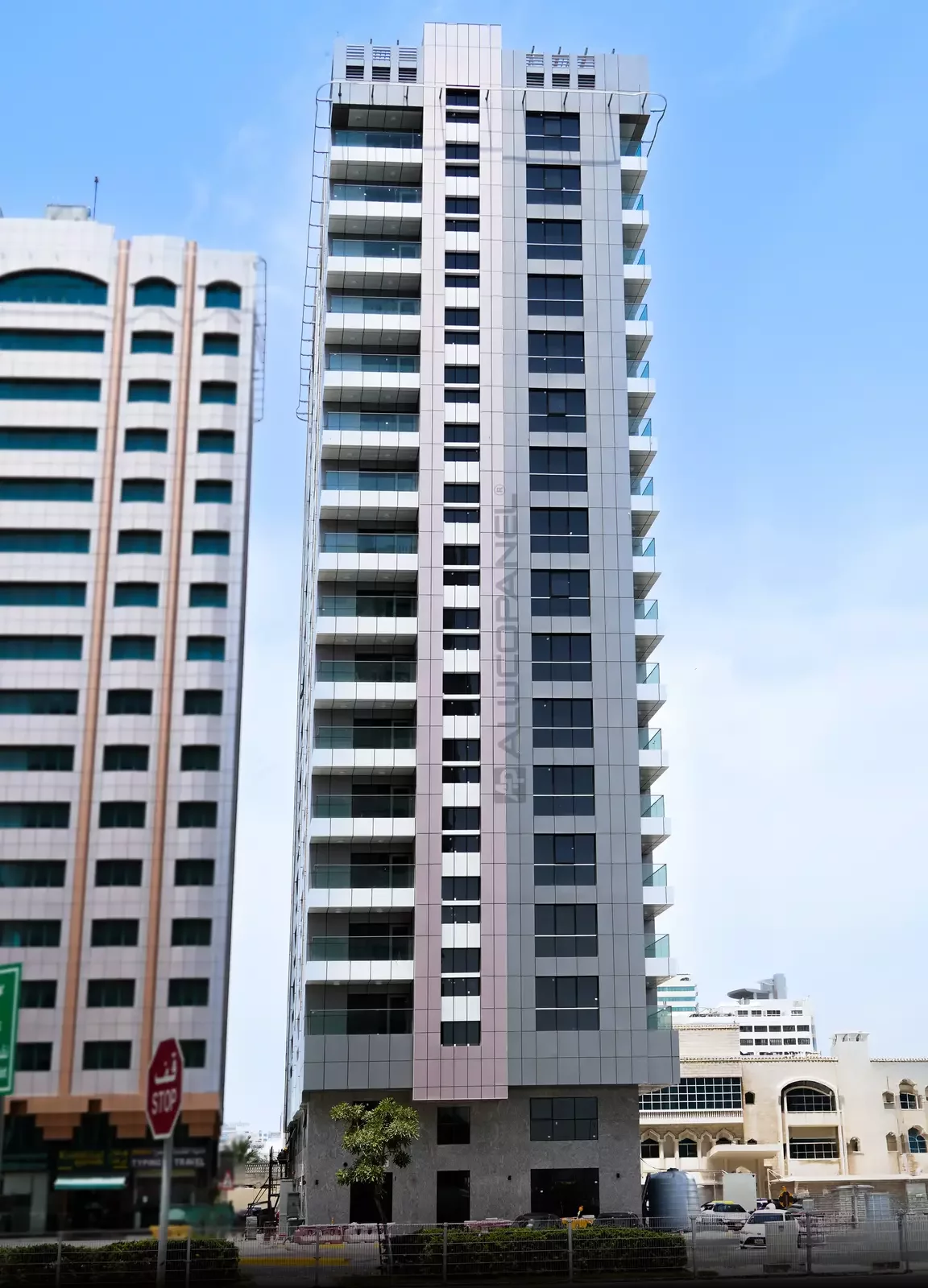 ALUCOPANEL cladding on the podium corner of the Al Falah Street commercial building