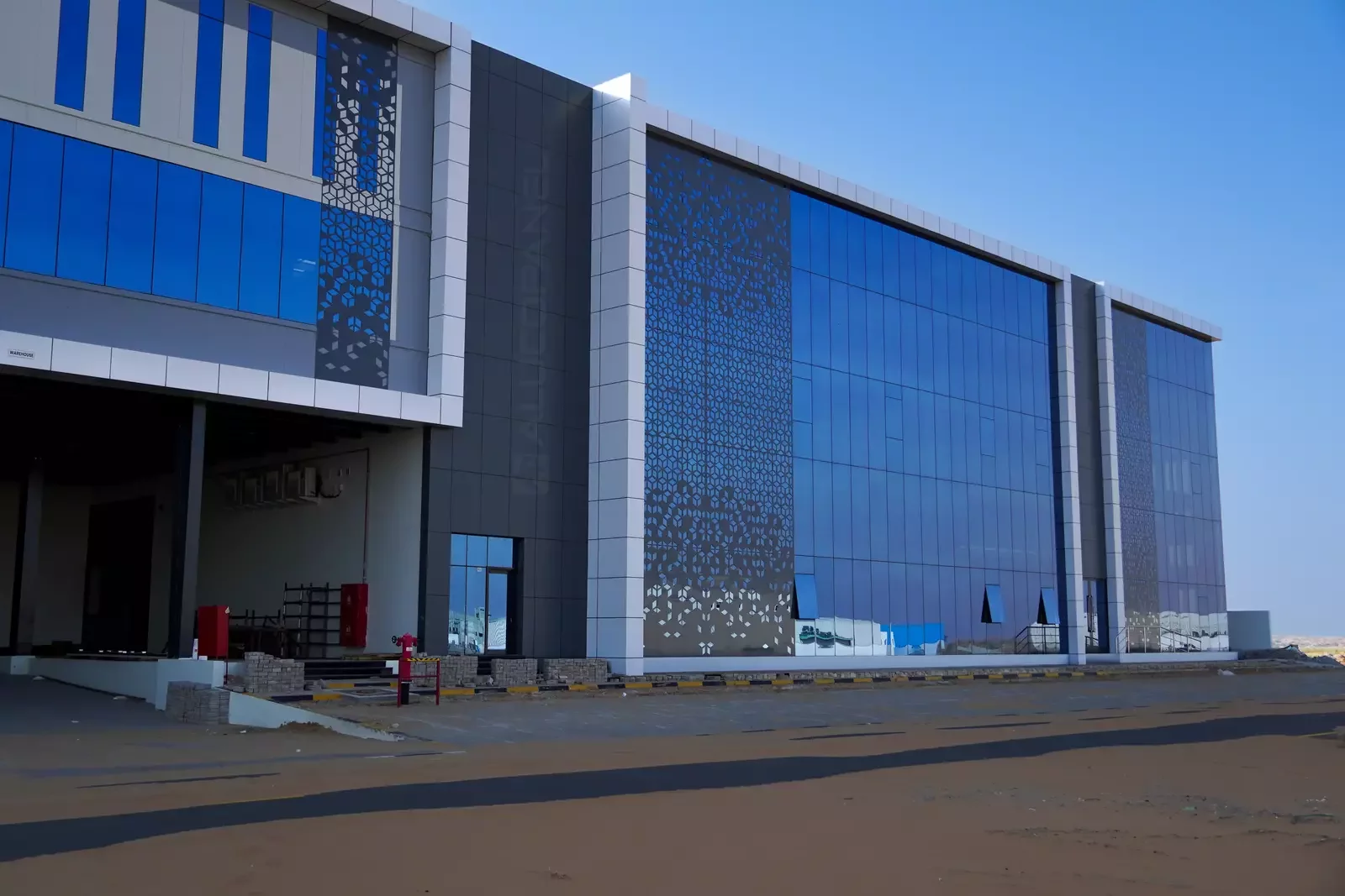 Side facade and loading docks of Landmark Offices and Warehouse, Umm Al Quwain