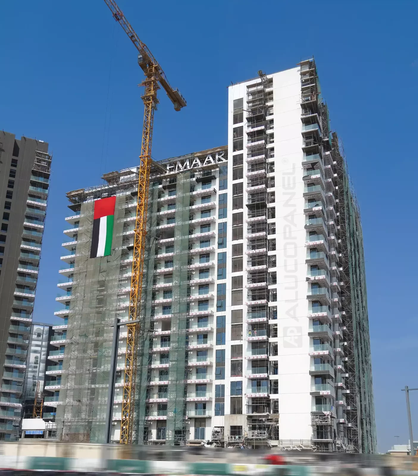 Street view of Green Side Residences in Dubai Hills during construction