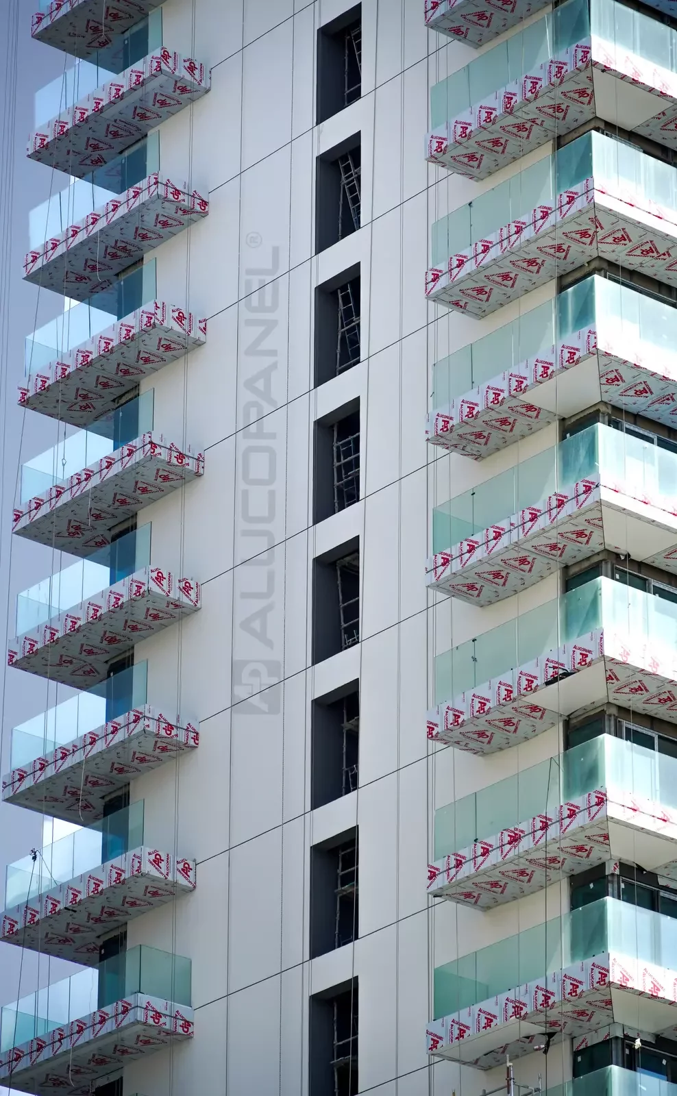 White ALUCOPANEL balconies with glass balustrades, Green Side Residences