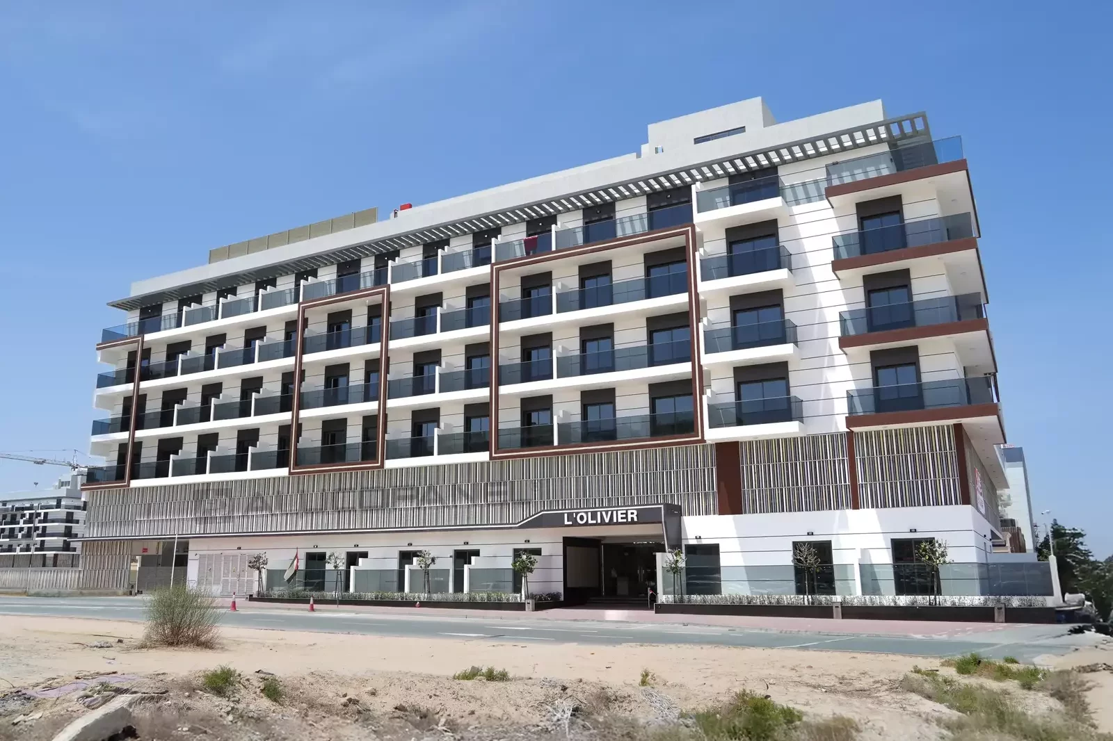 Residential and commercial building International City clad with ALUCOPANEL A2, photo 6