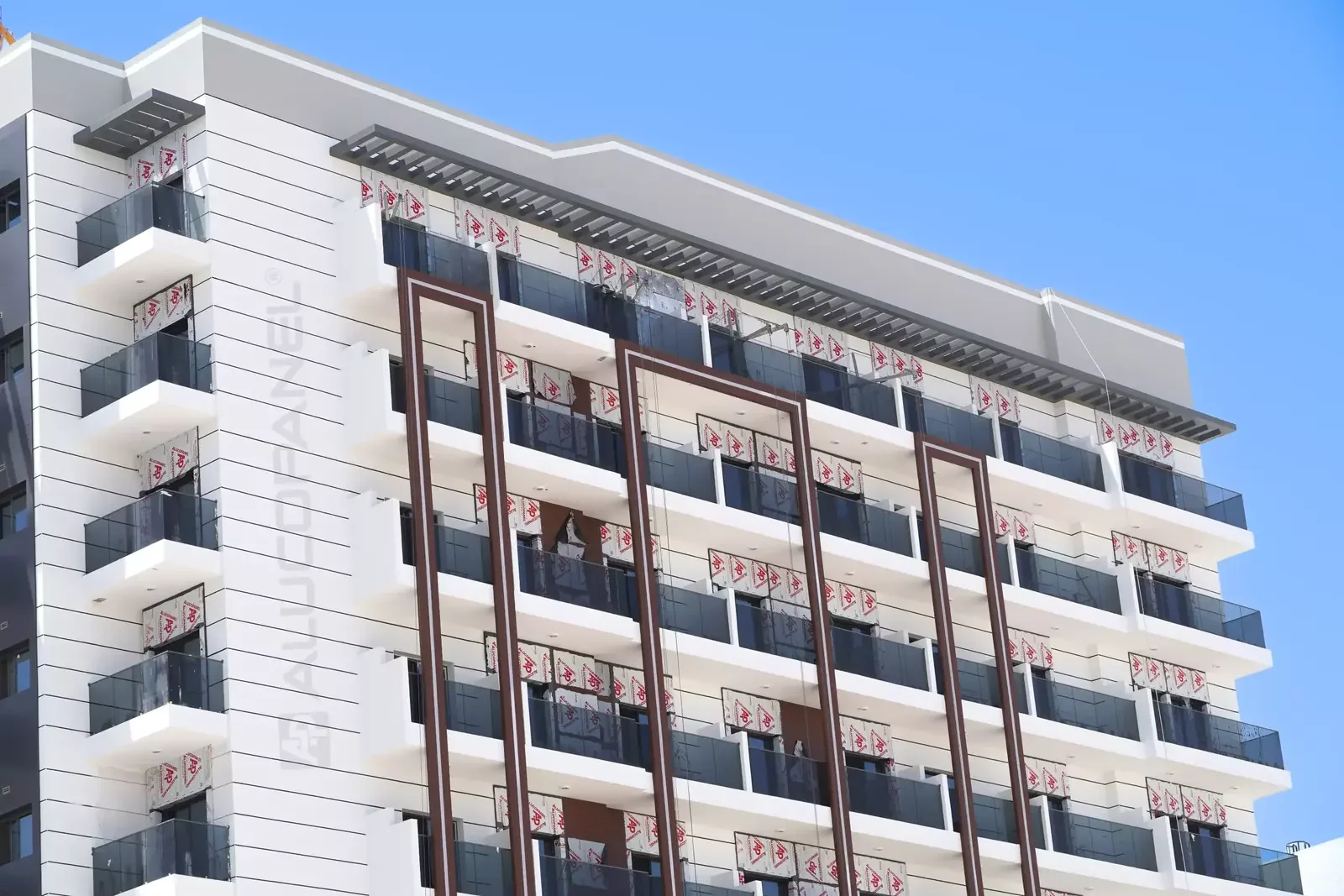 Residential and commercial building International City clad with ALUCOPANEL A2, photo 7