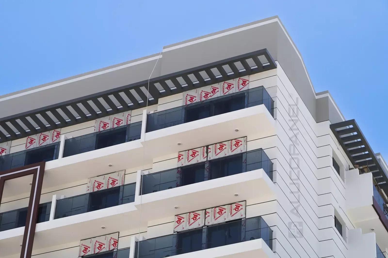 Residential and commercial building International City clad with ALUCOPANEL A2, photo 9